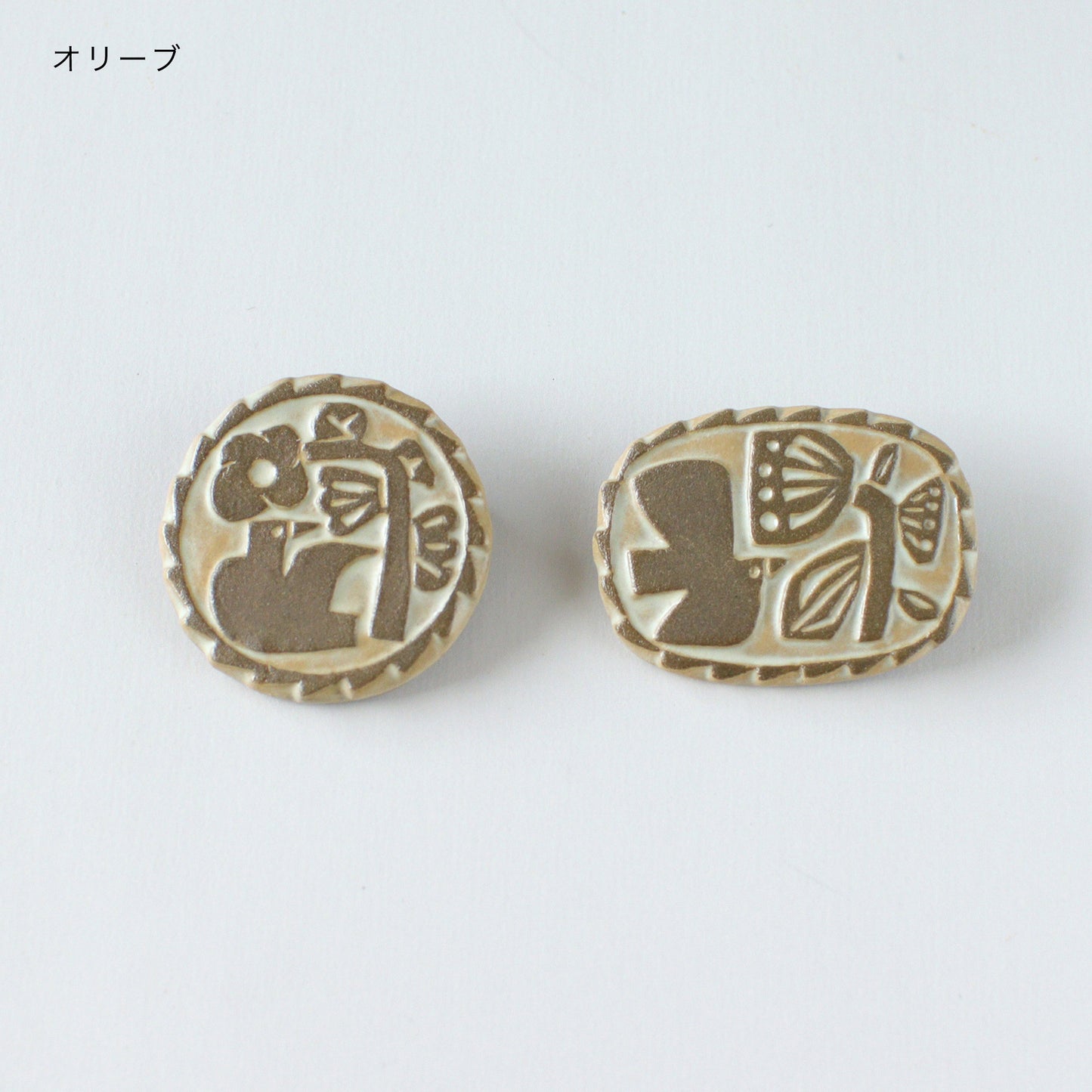 RELIEF BROOCH
